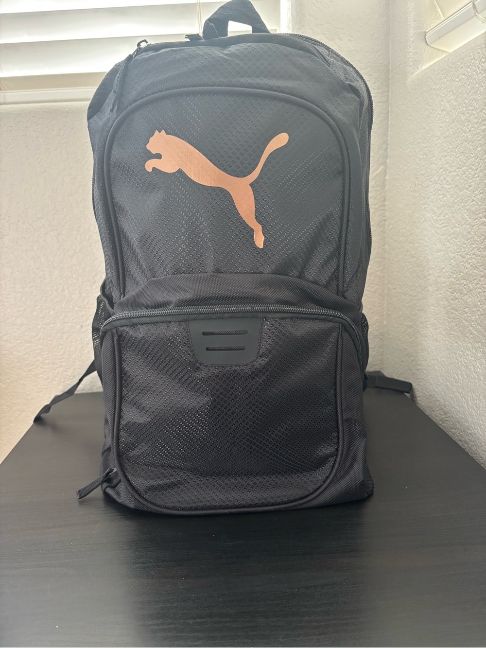 Puma Black Backpack with Copper Puma Logo